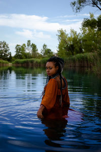 A photoshoot of girl in the water