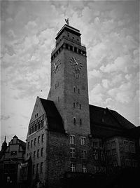 Low angle view of clock tower against sky