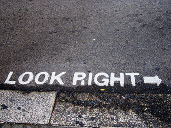 High angle view of text on road