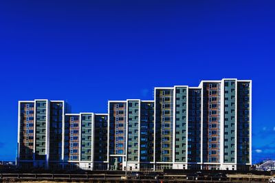 Modern buildings against blue sky