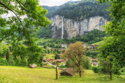 View of lauterbrunnen village and staubbach waterfall. 