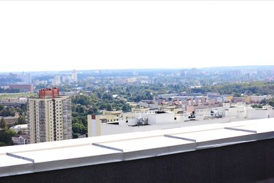 High angle shot of cityscape against clear sky