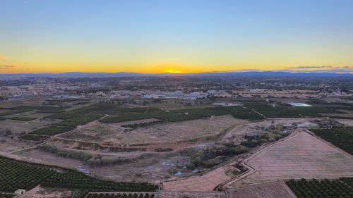 View of cityscape at sunset