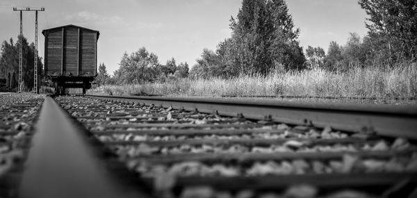 Surface level of railroad track against sky