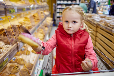 Boy looking away in store