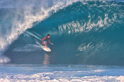 Man surfing in sea