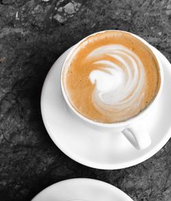 High angle view of cappuccino on table