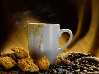 Close-up of coffee cup on table