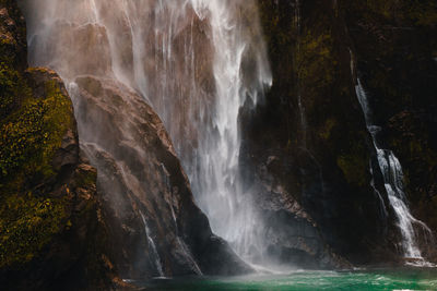 Scenic view of waterfall in forest