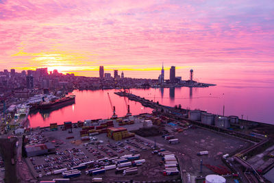 High angle view of buildings against sky during sunset