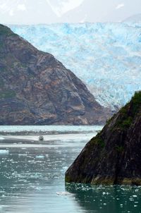 Scenic view of sea and mountain