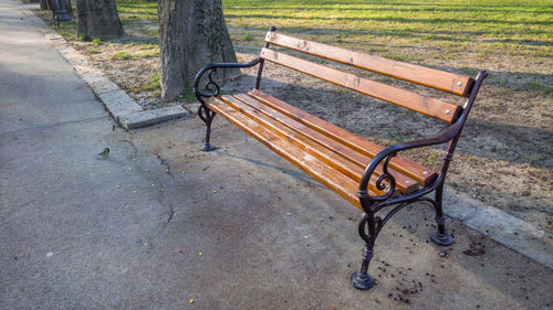 Empty bench in park