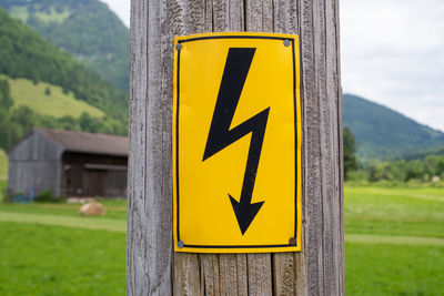 Close-up of electric sign on a utility pole 