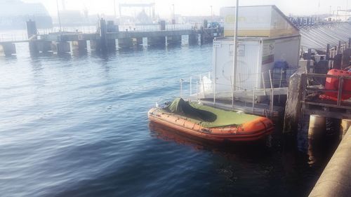 Boat moored on river