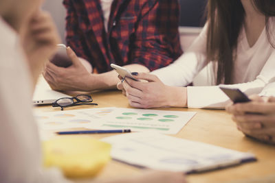 Group of people working on table