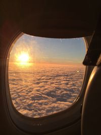 View of airplane wing seen through window