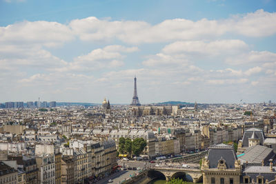 Distant view of eiffel tower amidst cityscape