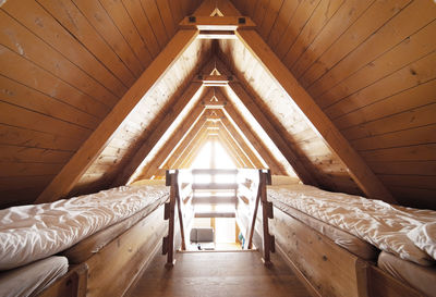 Low angle view of wooden staircase in building