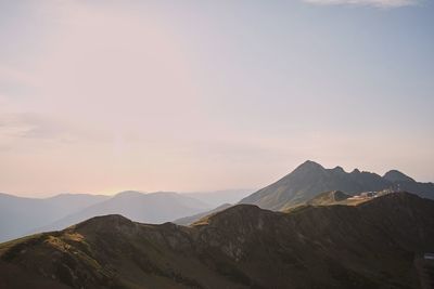 Scenic view of mountains against sky during sunset