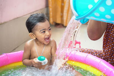 Cute girl in swimming pool