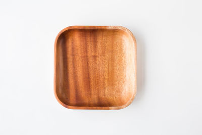 High angle view of bread against white background