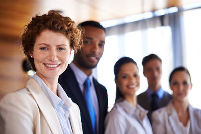 Portrait of smiling business people at office