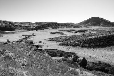 Scenic view of desert against clear sky