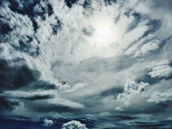 Low angle view of vapor trails in sky