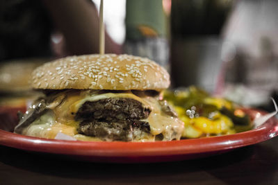 Close-up of burger in plate on table