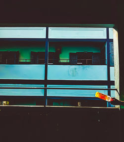 Building seen through train window