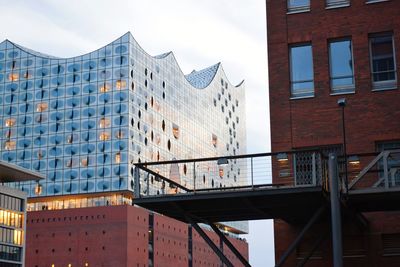 Low angle view of modern buildings against sky