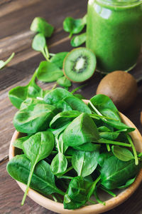 Close-up of green fruits on table