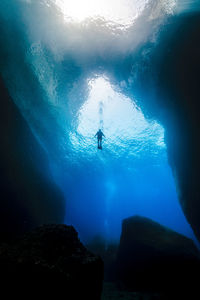 Man swimming in sea