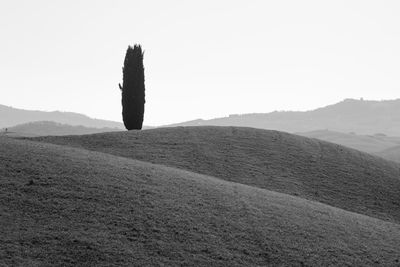 Scenic view of arid landscape against clear sky