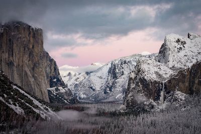 Scenic view of mountains against sky during winter