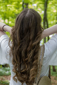 Rear view of woman looking away