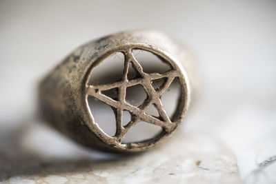 Close-up of metallic ring on table