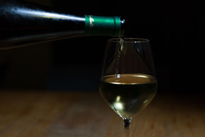 Close-up of wine in glass on table