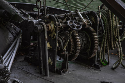 Close-up of rusty chain hanging on cable car