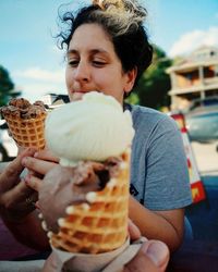 Portrait of man holding ice cream