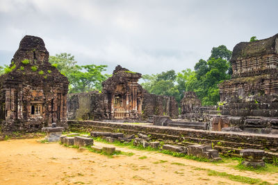 Old temple building against sky