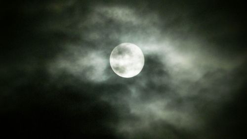 Low angle view of moon in sky