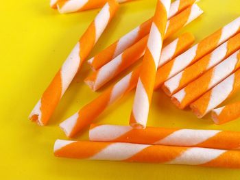 High angle view of orange slices over white background