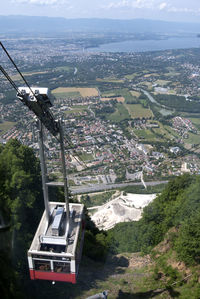 High angle view of overhead cable car on landscape against sky