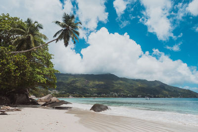 Scenic view of sea against cloudy sky