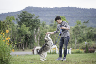 Full length of young man playing outdoors