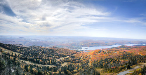 Scenic view of landscape against sky during autumn