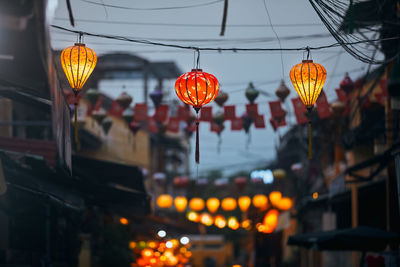 Traditional lanterns hanging on old street in hoi an in vietnam. night life in ancient town.