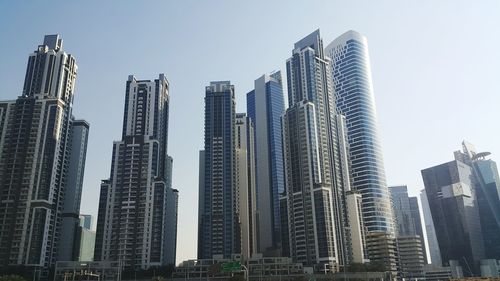 Low angle view of buildings against clear sky