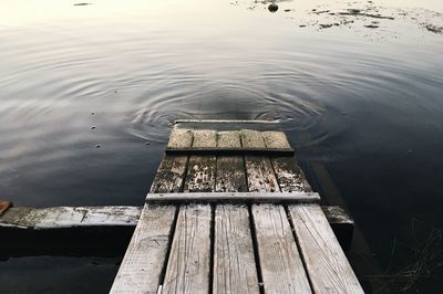 High angle view of wooden pier over lake